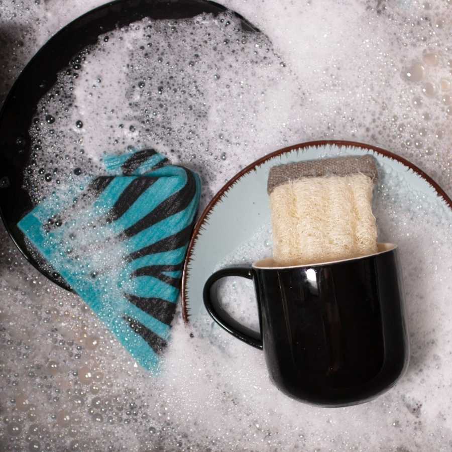 Loofah 2 en 1, éponge et support pour nettoyants solides