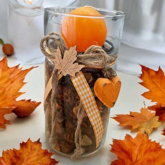 Photophore avec décorations d'automne