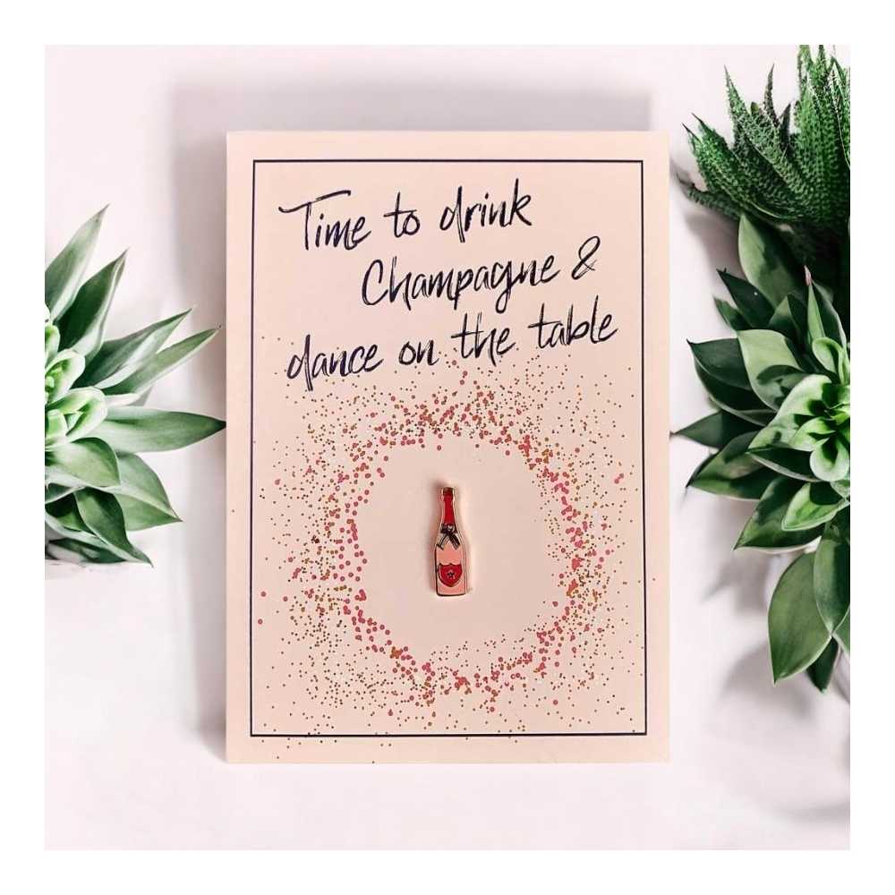 Carte d'anniversaire avec pin's champagne et enveloppe rose