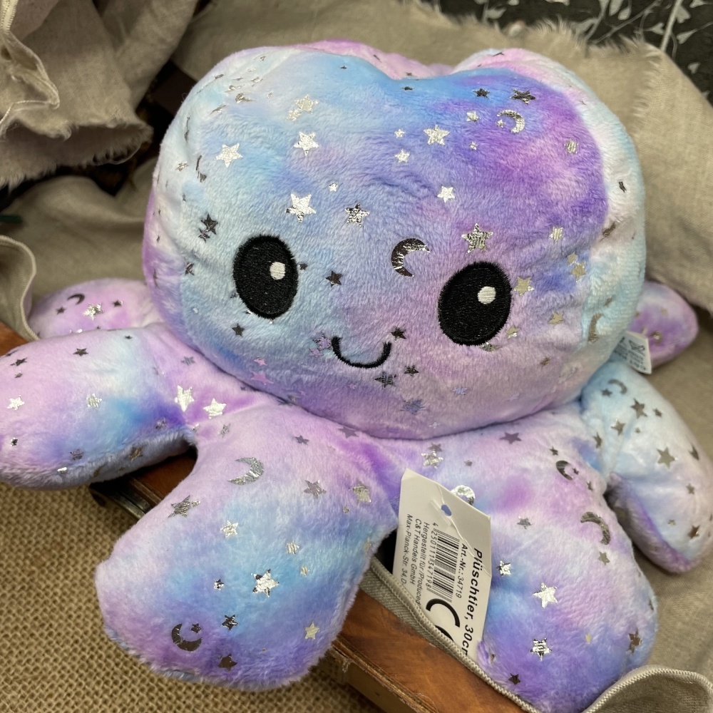 Peluche Octopus retournable 30 cm avec motifs étoilés